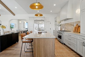 Kitchen island with Sub-Zero refrigerator
