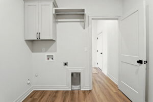 Laundry room with full hook-ups for washer and dryer