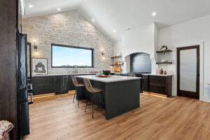 Kitchen with vaulted ceilings and oversized island