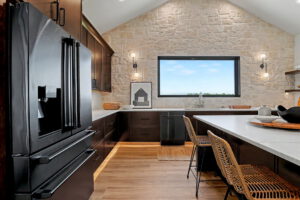 Kitchen with oversized refrigerator
