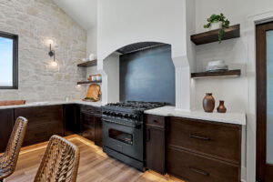 Gas range with generous counter space and built-in shelving