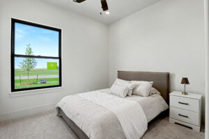 Guest bedroom with oversized window