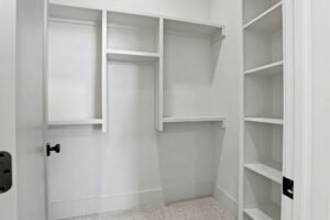 Guest bedroom closet with built-in shelving