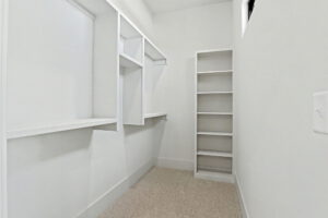 Guest bedroom closet with built-in shelving