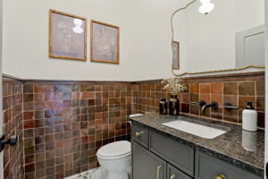 Guest bathroom with tile backsplash
