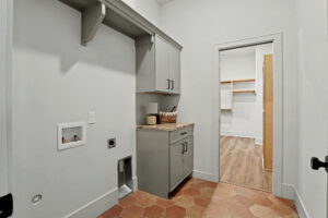 Laundry room with full washer and dryer hook-ups