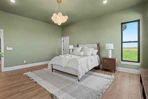 Master bedroom with custom light fixture