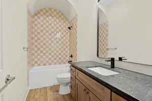 Guest bathroom with tile shower