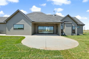 Rear exterior view of patio and sliding glass doors