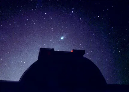 A shooting star over Lake Afton Observatory.