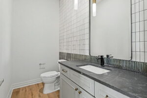 Half bathroom in the entryway hallway